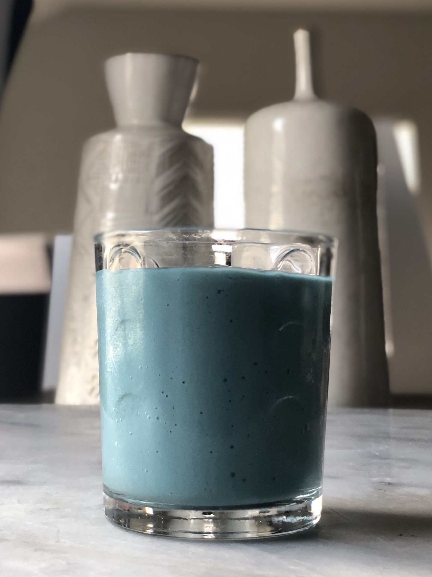 blue smoothie on counter top