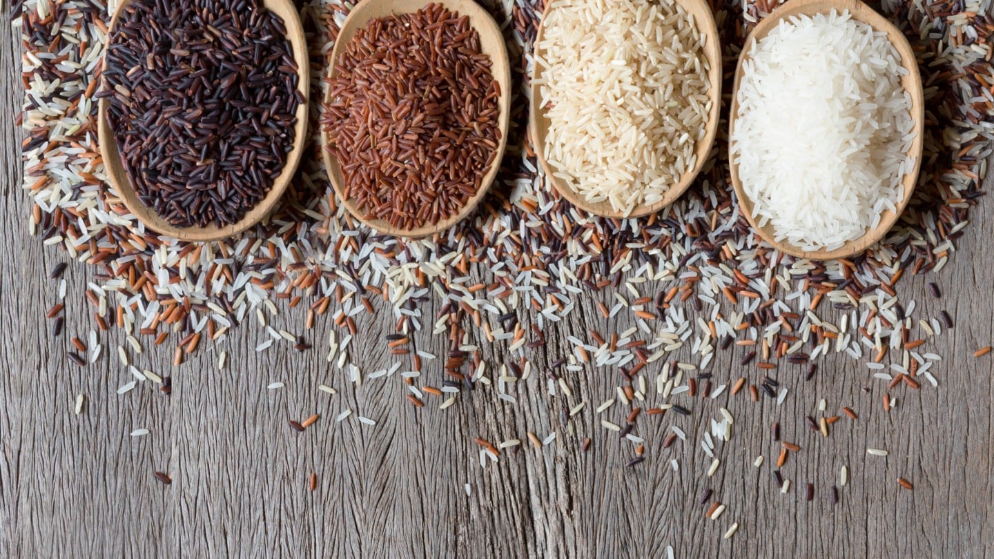 uncooked rice on spoons