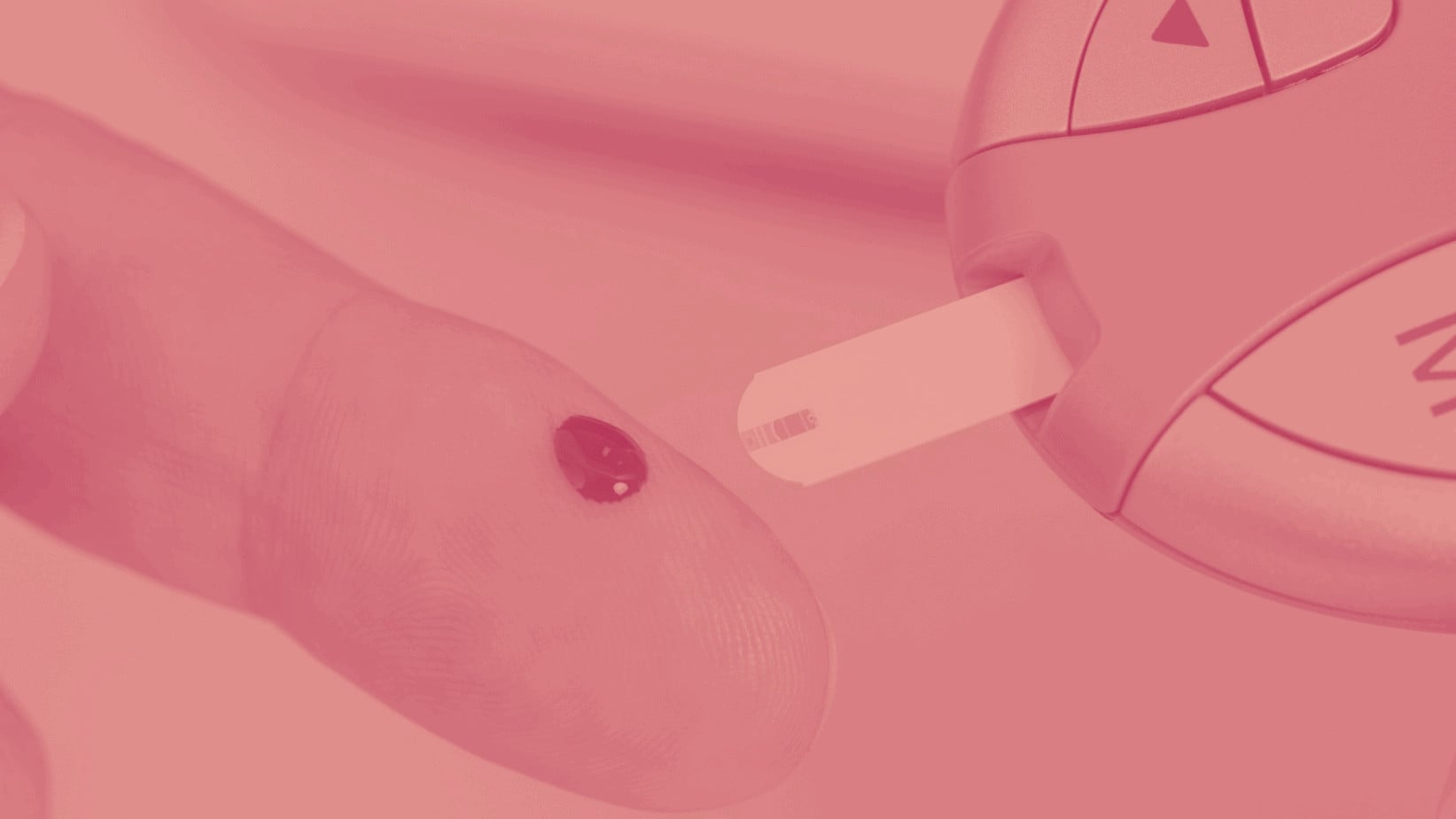 blood on a finger for glucose reading