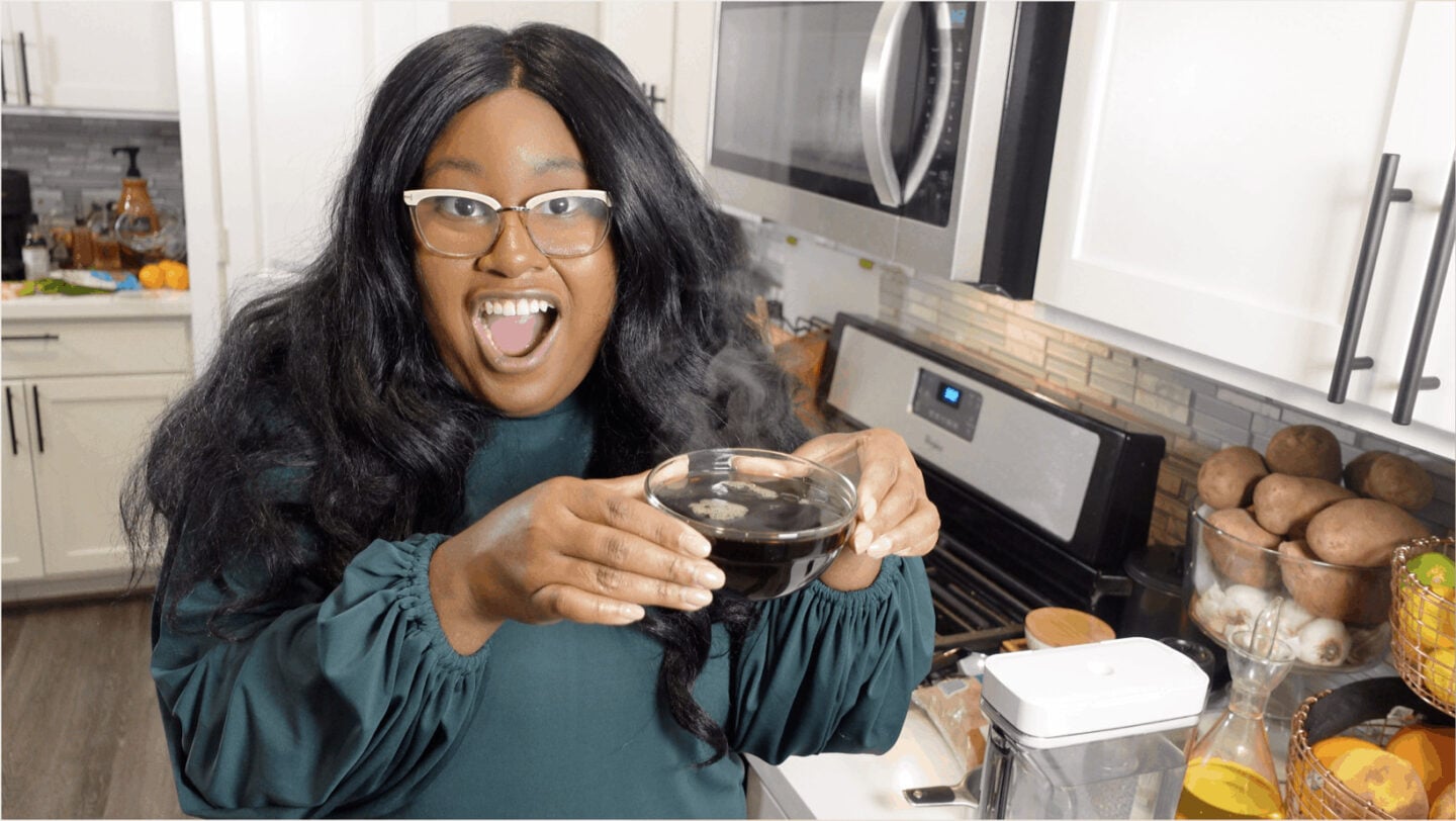 The Hangry Woman holding brown sugar simple syrup