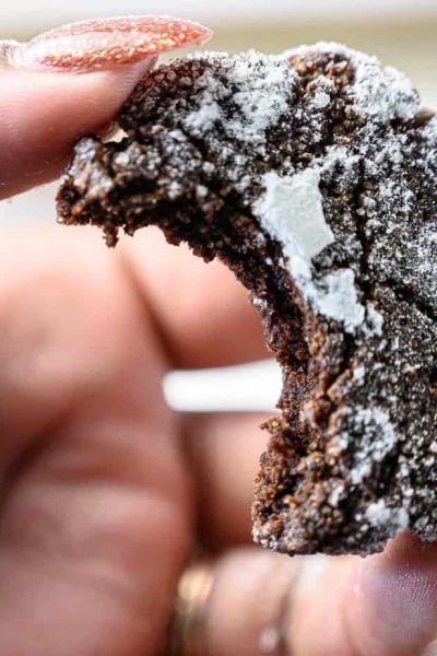 holding a crinkle cookie