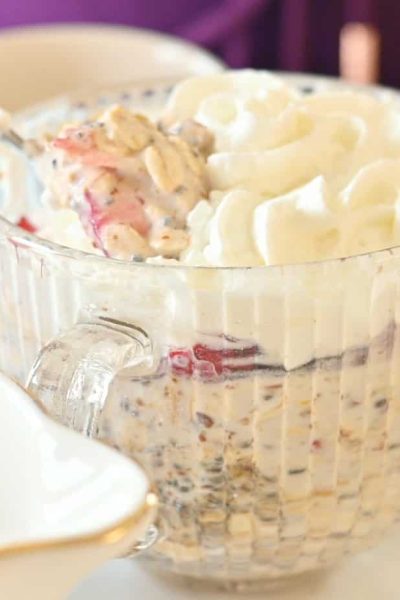 Overnight oats being scooped out of the bowl