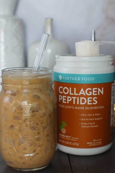 Further Foods Hazelnut Collagen Peptides and coffee drink in a mason jar