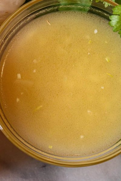 apple cider vinaigrette with cilantro leaves and honey